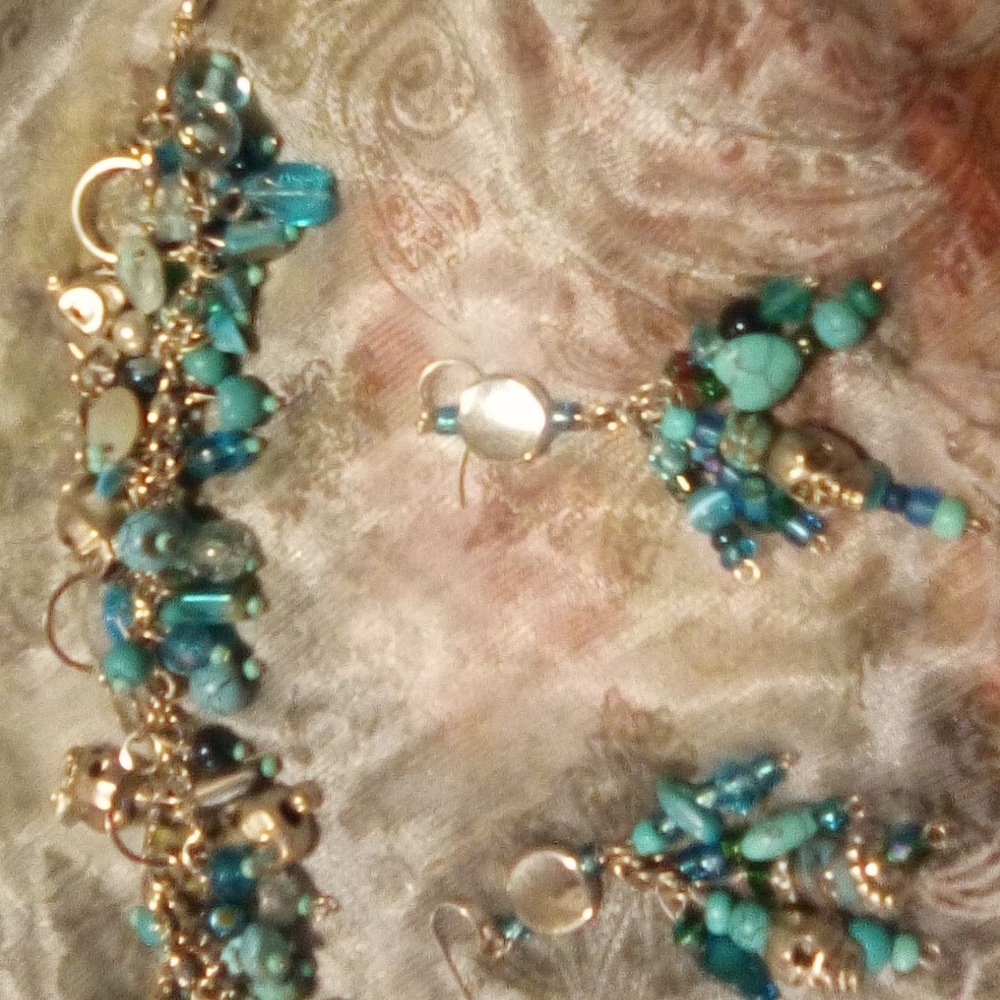 A silver and turquoise with skulls bracelet adj. & Earings, w/ gift box